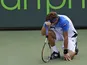 Spaniard David Ferrer reacts to losing a challenge at the Miami Masters Final on March 31, 2013