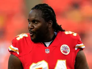 Defensive end Tyson Jackson of the Kansas City Chiefs warms up prior to the preseason game against the Green Bay Packers at Arrowhead Stadium on August 29, 2013