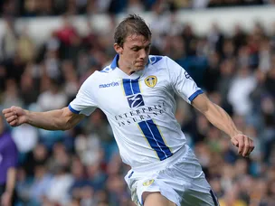 Warnock strike puts Leeds in front
