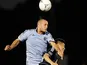 Sporting Kansas City's Aurelien Collin heads the ball on February 29, 2012