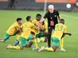 South Africa coach Hugo Broos greets players