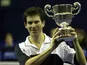 26 Nov 2000: Tim Henman of England with the trophy after his straight sets win over Dominik Hrbaty of Slovakia in the final of the Samsung Open at the Brighton Centre, Brighton.