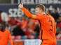 Netherlands' Under-21s Perr Schuurs celebrates scoring their first goal on June 3, 2021