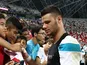 Daniel Bachmann of Stoke City signs autographs for fans during a Stoke City open training session ahead of the match between Stoke City and Everton during the 2015 Barclays Asia Trophy Tournament at the Sports Hub National Stadium on July 14, 2015