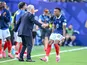 Kylian Mbappe and Didier Deschamps of France