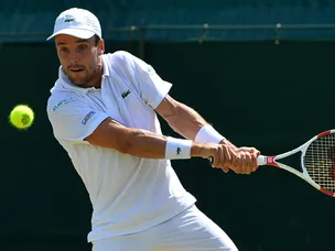 Bautista Agut progresses after Goffin withdraws