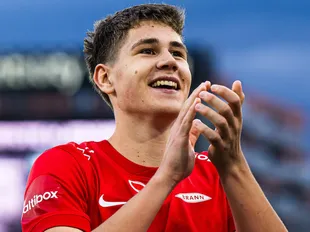 Heading for Old Trafford? 'Giant' centre-back 'scouted by Man United'