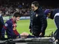 Barca star Lionel Messi is stretchered off injured on December 5, 2012