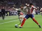 Real Madrid's Dani Carvajal in action with Atletico Madrid's Jose Gimenez in La Liga on September 28, 2019