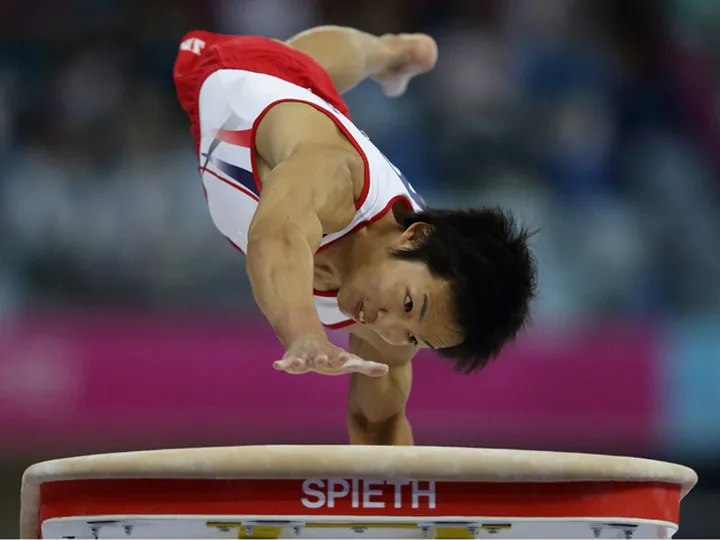 Japan stun China to win gymnastics team gold