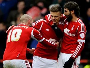 Lansbury penalties give Forest lead