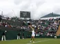 Ana Ivanovic serves against Virginie Razzano at Wimbledon on June 24, 2013