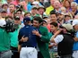 Masters winner Jordan Spieth is congratulated by 2014 champ Bubba Watson on April 12, 2015