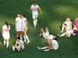 England's Steph Houghton and team mates look dejected after the match against Sweden on July 6, 2019