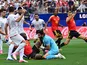 Belgium's Romelu Lukaku and Iran's Alireza Beiranvand