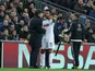 Tottenham Hotspur midfielder Mousa Dembele talks with manager Mauricio Pochettino on the touchline during his side's clash with Bayer Leverkusen at Wembley Stadium on November 2, 2016