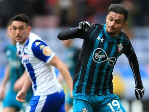 Saints oust brave Wigan to reach semis