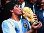 Argentina's Diego Maradona celebrates with the 1986 World Cup trophy