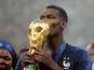 France midfielder Paul Pogba kisses the World Cup trophy in 2018