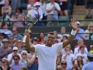 Tsonga through to round three in straight sets