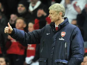 Wenger 'relieved' to reach group stage