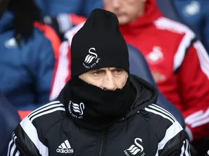 Swansea boss Guidolin taken to hospital