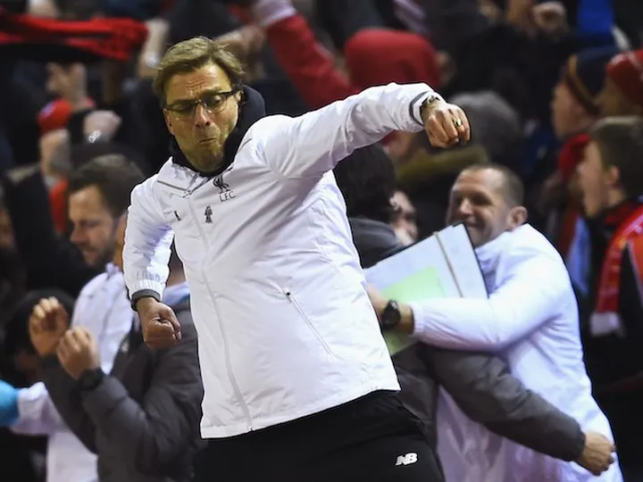 Liverpool progress at Man United's expense