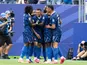 Kylian Mbappe and France teammates celebrating against Iraq