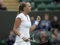 Petra Kvitova of the Czech Republic reacts after winning her match against Coco Vandeweghe of the United States during their Women's first round singles match on June 24, 2013