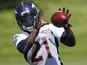 Denver Broncos running back Ronnie Hillman catches a pass during off season training camp on June 6, 2013