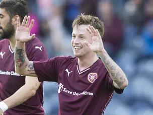 Five-star Livingston thrash 10-man Hearts after late goal glut