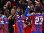 Crystal Palace's Ismaila Sarr celebrates scoring with Jaydee Canvot and Tyrick Mitchell on April 9, 2026
