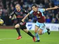 Jack Wilshere and Jack Cork in action during the Premier League game between Burnley and Arsenal on November 26, 2017