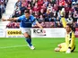 Graham Cummins of St Johnstone celebrates after scoring during the Ladbrokes Scottish Premiership match between Heart of Midlothian FC and St Johnstone FC at Tynecastle Stadium on August 2, 2015