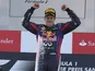 Red Bull driver Sebastian Vettel of Germany celebrates on the podium after he won the German Formula One Grand Prix on July 7, 2013