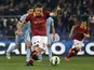 Roma captain Francesco Totti scores a penalty against Lazio on April 8, 2013