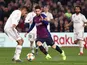 Barcelona forward Lionel Messi is crowded out by Real Madrid players on February 6, 2019