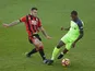 Jack Wilshere and Georginio Wijnaldum in action during the Premier League game between Bournemouth and Liverpool on December 4, 2016