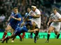 England's Manu Tuilagi is tackled by France's Morgan Parra during the RBS Six Nations match on February 23, 2013