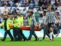 Aston Villa's Tyrone Mings is carried off the pitch in a stretcher after sustaining an injury on August 12, 2023