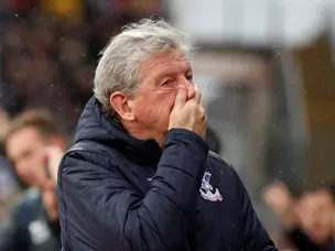 Hodgson defends Zaha over Twitter abuse