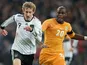Germany's Stefan Kiessling in action with Ivory Coast's Guy Demel on November 18, 2009