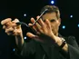 Uri Geller and a bent spoon in 2008