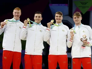 England beat Australia by 0.08 seconds for medley relay gold