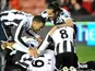 Papiss Cisse is mobbed by team mates after scoring the opener against Stoke on November 28, 2012