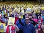 Liverpool fans holding Show FSG the Yellow Card flyers, in protest against the planned ticket price increases, pictured during the Premier League match between Liverpool and Crystal Palace. Picture date: Saturday April 25, 2026.