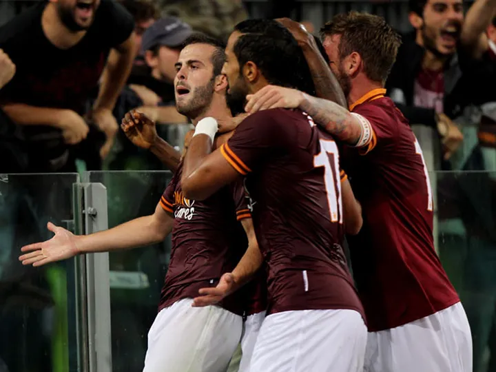 Roma edge ahead of Bologna