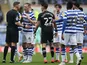 Reading's Michael Morrison talks to referee Robert Jones after Huddersfield's Danny Ward scored their third goal on January 22, 2022