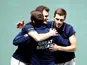 Britain's Jamie Murray and Neal Skupski celebrate with captain Leon Smith after winning their doubles match against Kazakhstan's Alexander Bublik and Mikhail Kukushkin on November 21, 2019