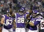 Vikings back Adrian Peterson celebrates his first touchdown of the night against the Bears on December 9, 2012
